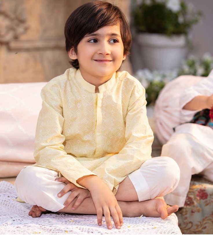 1 Piece - Kurta Shalwar (2 Piece) Dress up your little one in this dashing yellow schiffli embroidered cambric kurta for Boys. Details : Shirt : Yellow schiffli embroidered cambric shirt. White Bottoms Country of Origin : Pakistan Care Instruction : Should be washed in gentle cycle and hung to dry. Color may bleed so please be mindful of other items with it. Disclaimer : Size chart provides reference sizes and actual sizes might be slightly different from the size chart. Actual colors of the outfit may vary from the colors being displayed on the screen. Eid Yellow Kurta With Chikankari Embroidery, Long Sleeve Yellow Kurta For Eid, Yellow Long Sleeve Kurta For Eid, Yellow Dabka Kurta For Eid, Yellow Cotton Kurta With Dabka, Yellow Cotton Kurta With Dabka Detail, Yellow Festive Kurta For Eid, Yellow Cotton Kurta With Dabka Work, Yellow Kurta For Festive Occasion And Eid