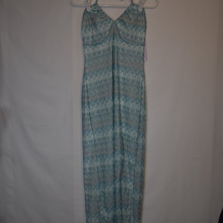 Brand: Wild Fable Style: Long Ankle Length Dress Color: Patterned Blue And White Size: Medium Material: Recycled Polyester Condition: New With Tags Absolutely Stunning Dress With An Open Back. Ankle Length With A Halter Top Light Blue Fitted Maxi Dress For Beach, Fitted Light Blue Maxi Dress For Beach, Fitted Light Blue Maxi Dress For Vacation, Blue Stretch Sundress Maxi Dress, Blue Stretch Maxi Dress For Day Out, Blue Stretch Maxi Dress For Vacation, Blue Maxi Dress For Beach, Blue Maxi Dress For The Beach, Ankle Length Dress