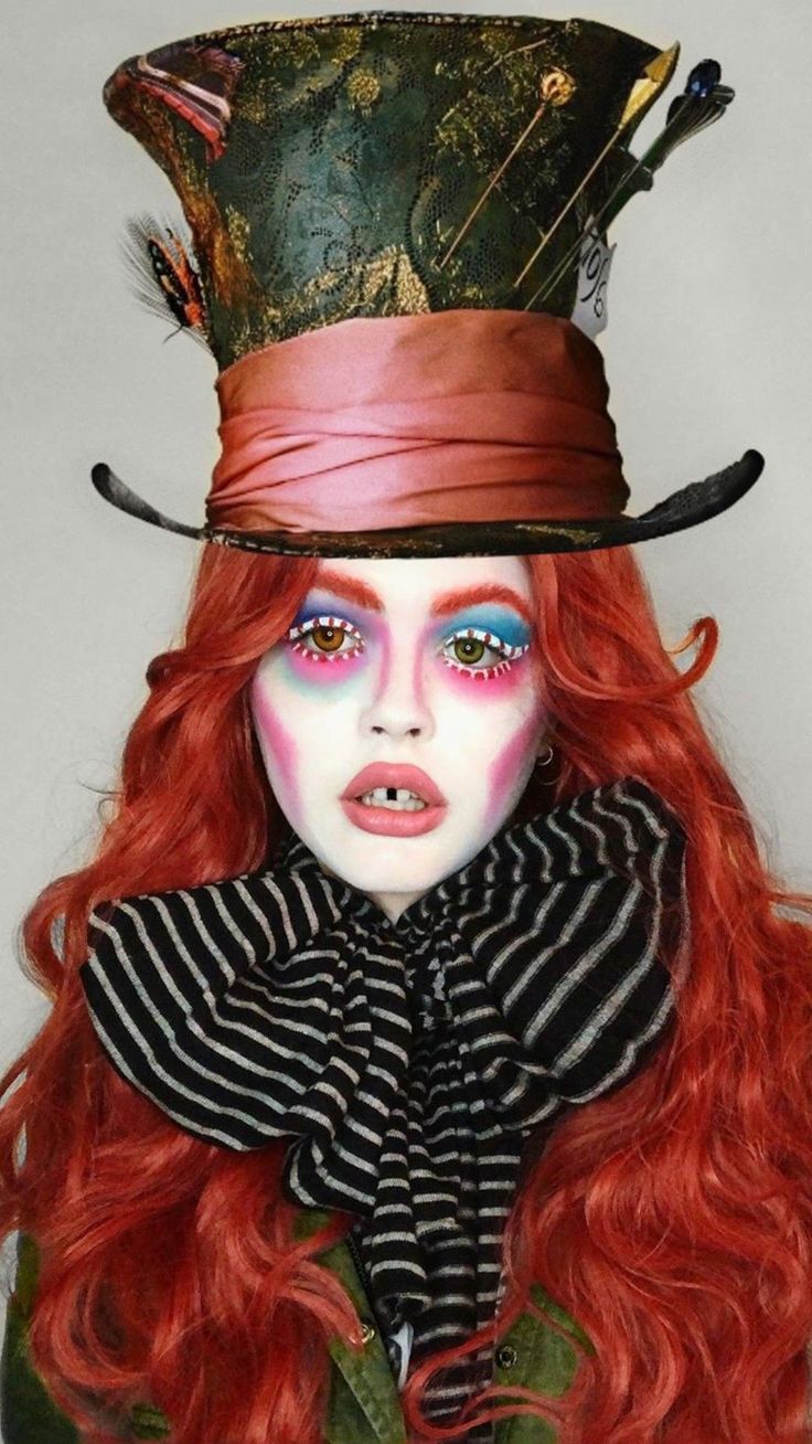 a woman with red hair and makeup wearing a hat