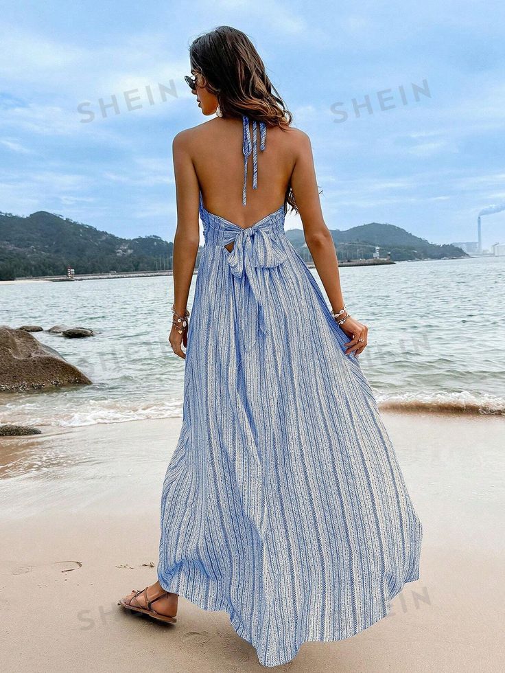 Color : BlueStyle : BohoDetails : Backless, Split ThighType : CamiPattern Type : Plain, StripedSleeve Length : SleevelessNeckline : HalterWaist Line : High WaistHem Shaped : SlitLength : LongFit Type : Slim FitFabric : Non-StretchMaterial : FabricComposition : 100% PolyesterCare Instructions : Machine wash, do not dry cleanSheer : No Size US Bust Length Straps Length Waist Size S 4 36.2 48.8 32.3 26.8-41.7 M 6 37.8 49.2 32.5 28.3-43.3 L 8/10 40.2 49.6 32.8 30.7-45.7 XL 12 42.5 50 33.1 33.1-48 Blue V-neck Dress For Summer Parties, Blue Backless Beach Dress For Summer, Light Blue Maxi Dress For Beach Cover-up, Chic Light Blue Beach Dress, Chic Light Blue Dress For Beach Season, Blue Sundress For Summer Parties And Spring, Blue Summer Dresses For Parties, Light Blue Backless Summer Dress, Chic Blue Halter Neck Beach Dress