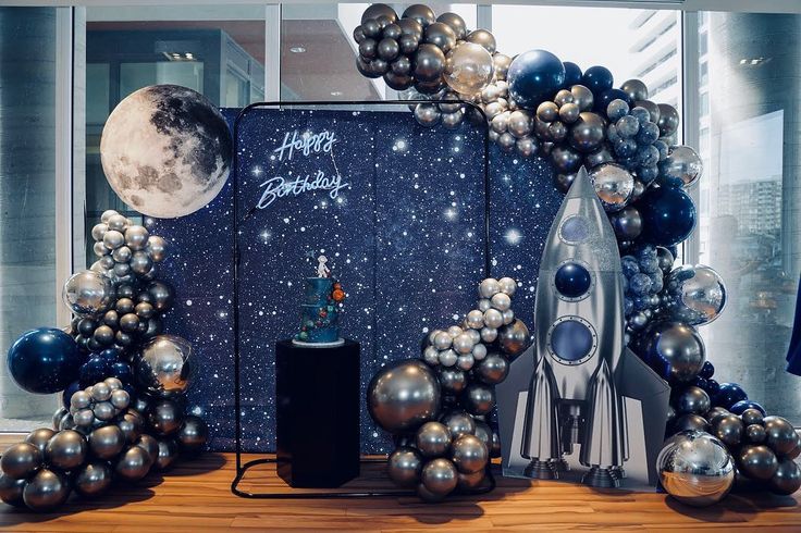 an image of a space themed display with balloons