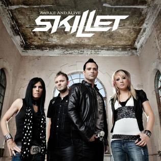 the band skillet is posing for a photo