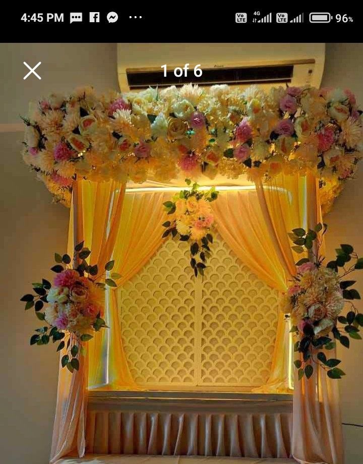 an image of a window decorated with flowers and greenery for a wedding or special event