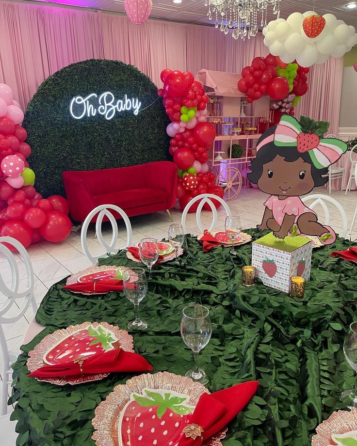 a table set up for a baby's first birthday party