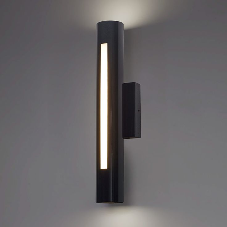 a wall mounted light that is on the side of a wall