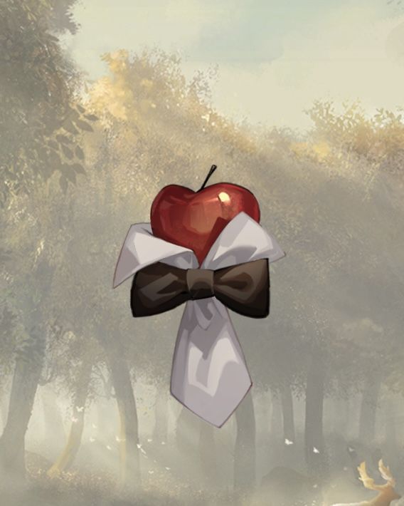 an apple with a bow tie hanging from it's side in front of trees