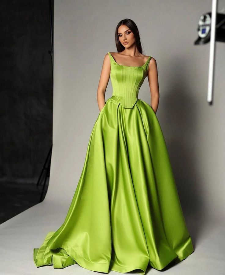 Make a statement in our Priscila Gown. Crafted from Spandex Satin, this elegant A Line dress features a rich green hue that is sure to turn heads at any evening event. With its long length, it is perfect for proms or parties. Exude sophistication and grace with our exclusive gown. Taffeta Ball Gown, Brocade Ball Gown, Green Evening Dress For Banquet During Prom Season, Green Maxi Dress For Gala During Prom Season, Green Ball Gown With Fitted Bodice For Prom Season, Elegant Green Ball Gown, Green Ball Gown With Fitted Bodice For Prom, Green Ball Gown Evening Dress For Prom, Green Ball Gown With Fitted Bodice