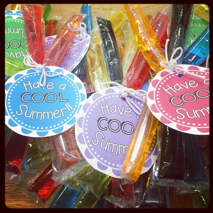 colorful candy sticks with tags that say have a cool summer