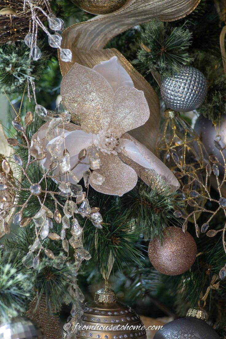 a christmas tree with ornaments hanging from it