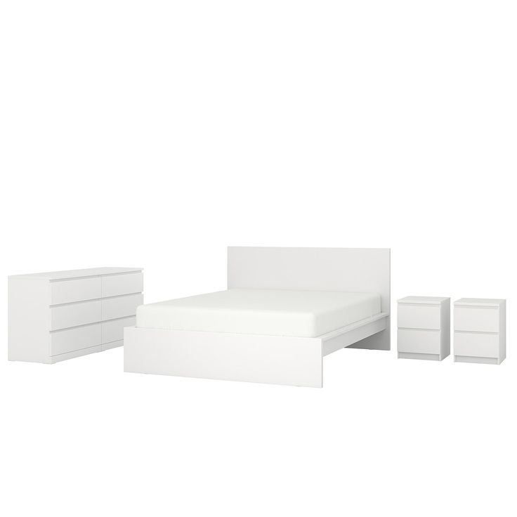 a white bed sitting next to two nightstands and a night stand on top of a white floor