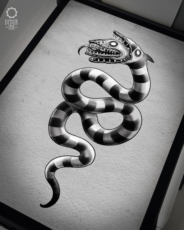 a black and white drawing of a snake