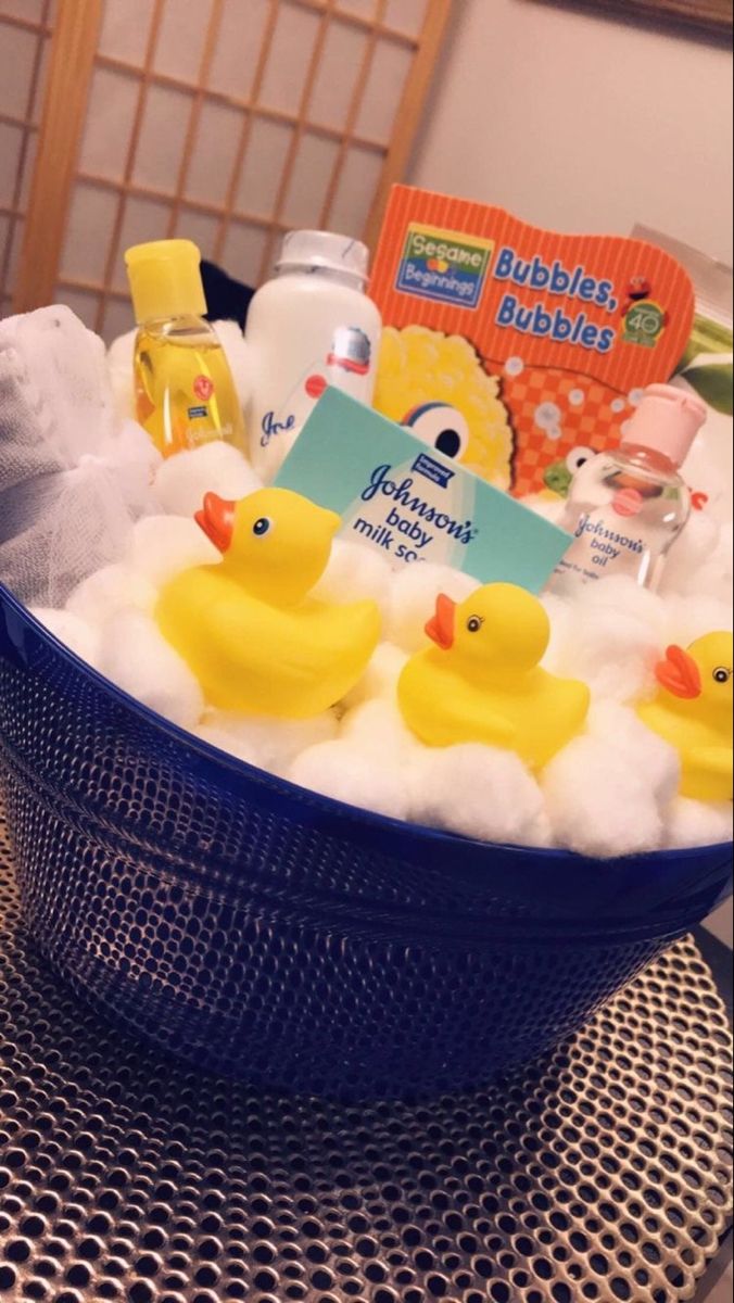 a blue bowl filled with lots of bath products