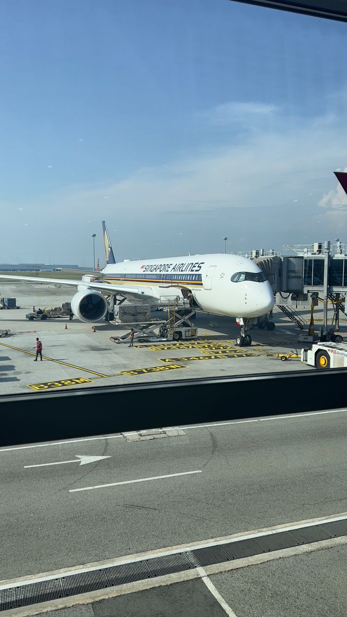 an airplane is parked at the airport terminal