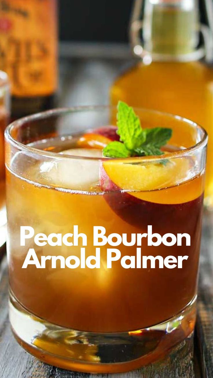 a close up of a drink in a glass on top of a wooden table with the words peach bourbon almond palmer