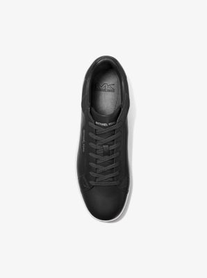 Designed with a minimalist aesthetic, the Keating low-top sneakers are a refined option for workdays or weekends. Made from supple leather, this sleek style works equally well with a suit or cuffed denim. Lace-up Sneakers With Leather Sole For Work, Casual Round Toe Sneakers For Work, Low-top Work Sneakers With Rubber Sole, Low-top Sneakers With Textured Sole For Work, Casual Low-top Workwear Sneakers, Casual Low-top Sneakers For Work, Classic Low-top Business Sneakers, Classic Low-top Formal Sneakers, Low-top Sneakers With Rubber Sole For Work