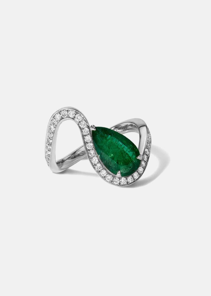 - The Trace Collection The Emerald Diamond Trace Pavé Ring is crafted of polished 18 karat gold, showcasing a fluid line of diamonds that delicately dances around the finger with a nestled 1.6ct pear cut emerald. 1.6ct emerald | approx 0.45tcw diamonds Custom variations can be made with alternative stone sizes. For inquiries: bespoke@katkimfinejewelry.com Available in Yellow Gold, White Gold — Platinum upon request. Please note: All our pieces are made to order and requires 2-4 weeks for product Emerald Two Stone Ring, Stylish Diamond Rings, Luxury Pear-shaped Diamond Ring With Pavé Setting, Luxury Pear-shaped Emerald Ring With Prong Setting, Luxury Pear-shaped Rings With Pave Setting, Dazzling Teardrop White Gold Rings, Elegant Teardrop Emerald Ring In Silver, Teardrop White Gold Diamond Ring Fine Jewelry, Luxury Pear-shaped Brilliant Cut Emerald Ring