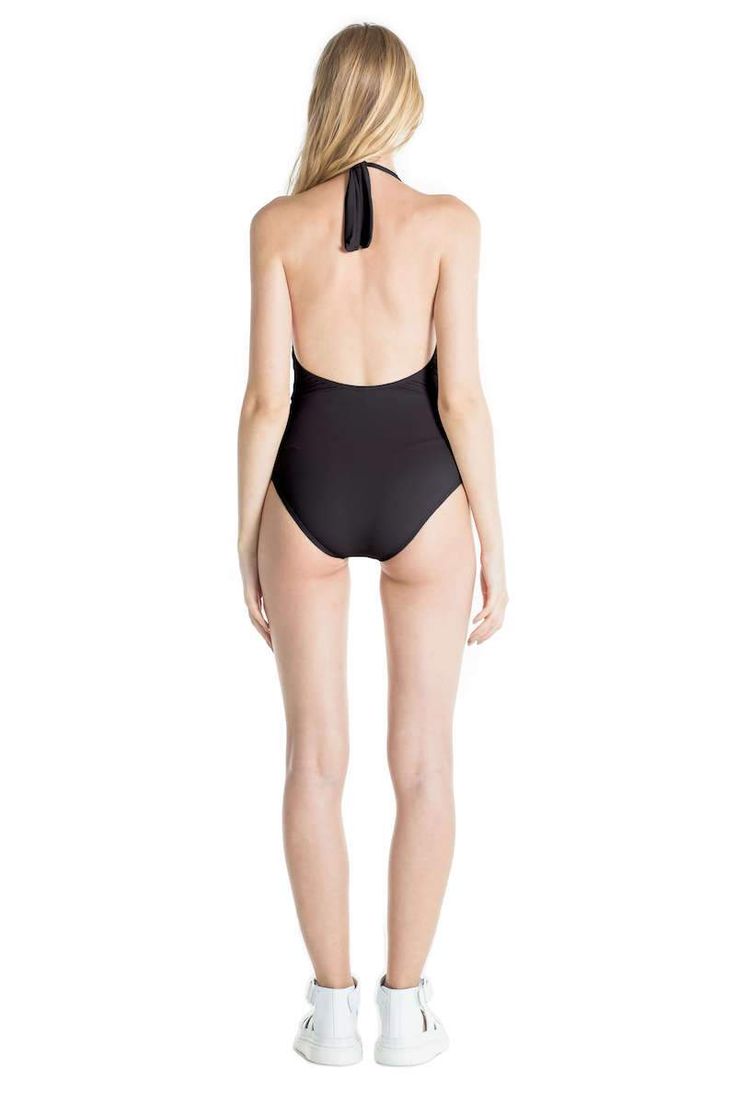 Marina halter one piece swimsuit in black Chic Low Back Swimwear For Pool, Chic Low Back Swimwear For The Pool, Elegant Stretch Halter Top For Pool, Elegant Halter Neck Top For Poolside, Elegant Backless Halter Top For Beach, Backless Halter Top For Poolside, Chic Backless Swimwear With Ruched Back, Elegant Halter Top For Poolside, Elegant Summer Halter Top For Pool