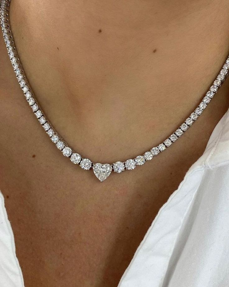 Iced Out Diamond Choker Dainty Wedding Necklace, 9 MM Heart Cut Moissanite Diamond Tennis Necklace, 10k White Gold Handmade Necklace ------------------------------------------------------------------------------ The stones in the jewelry are 𝟏𝟎𝟎% hand-crafted it is cut and polished by our experienced craftsman. 💎 𝐌𝐨𝐢𝐬𝐬𝐚𝐧𝐢𝐭𝐞💎 is the diamond's best alternative. ------------------------------------------------------------------------------ ● 𝐌𝐨𝐢𝐬𝐬𝐚𝐧𝐢𝐭𝐞 𝐃𝐞𝐭𝐚𝐢𝐥𝐬 👉 Mai Diamond Cuff Necklace, Silver And Diamond Jewellery, Luxury Brilliant Cut Diamond Heart Necklace, Luxury Dazzling Single Strand Diamond Necklace, Classy Diamond Necklace, Luxury White Diamond Necklace In Refined Style, Custom Diamond Necklace, Luxury Baguette Cut Diamond Necklace For Wedding, Wedding Diamond Necklace