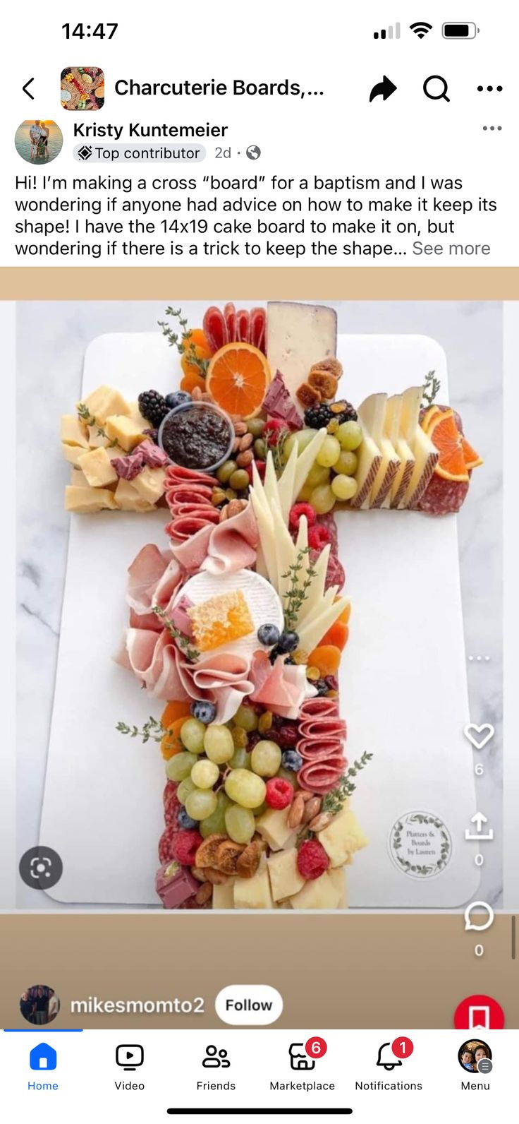 a cross made out of fruits and vegetables on top of a white tablecloth with an instagram message above it