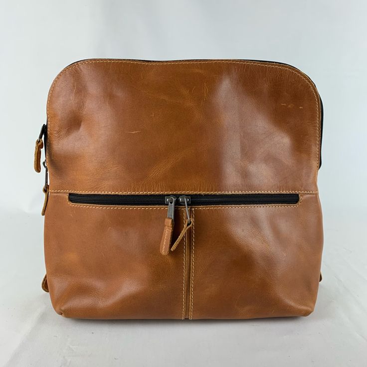 Dimensions 13”-12”-4” Material Cowhide Leather New With Tag Leather-handled Satchel Backpack For Errands, Satchel Backpack With Leather Handles For Errands, Rectangular Leather Backpack With Leather Handles, Leather Rectangular Backpack With Leather Handles, Leather-backed Shoulder Bag Backpack For Everyday Use, Leather Backed Shoulder Bag Backpack For Everyday Use, Brown Leather Satchel Backpack For Errands, Brown Leather Backpack For Errands, Everyday Leather-lined Backpack Shoulder Bag