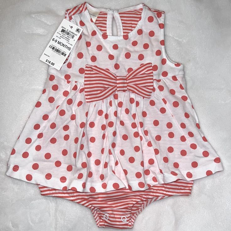 Brand New With Tag First Impression Coral And White Size 6-9 Months Perfect For Summer White Fitted Bubble Romper For First Birthday, Fitted White Bubble Romper For First Birthday, Cute White Sleeveless Bodysuit, Cute White Sleeveless Onesie, Fitted White Bubble Romper For Playtime, White Fitted Bubble Romper For Playtime, Fitted White Bubble Romper For Play, Playful White Bubble Romper For First Birthday, White Sleeveless Bubble Romper For Playtime