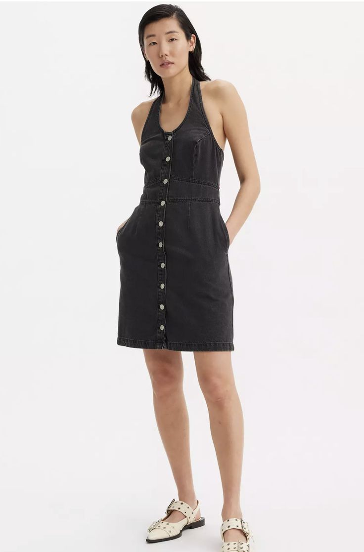 There's nothing more flattering than a classic mini. Our Halter Denim Dress features a vintage-inspired halter neckline, a button-up front and a slight A-line silhouette. Levi's Sleeveless Spring Dress, Levi's Sleeveless Dress For Spring, Levi's Sleeveless Summer Dress, Levi's Summer Denim Cotton Dress, Levi's Cotton Denim Summer Dress, Levi's Cotton Denim Dress For Summer, Levi's Casual Denim Dress For Summer, Levi's Casual Denim Summer Dress, Levi's Casual Summer Denim Dress