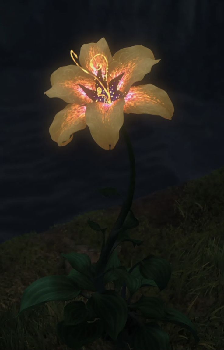 a large yellow flower sitting on top of a lush green field next to a body of water