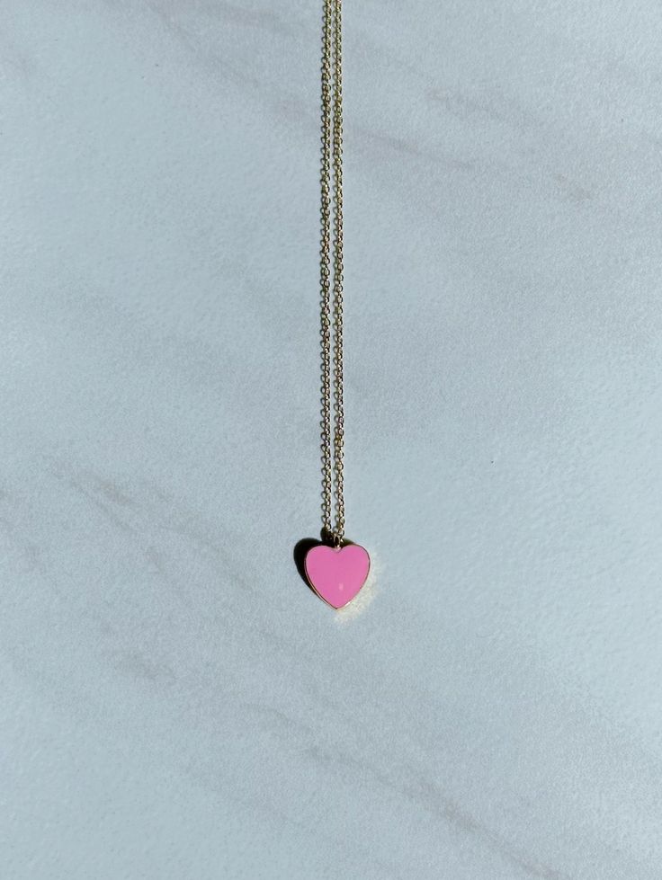 Small enamel gold heart charm on a 14k gold-plated or 14k gold filled chain necklace. Chain is 16 inches long and includes a two-inch extender chain. Cute Rose Gold Necklace With Heart Charm, Pink Heart Pendant Dainty Jewelry, Pink Dainty Jewelry With Heart Charm, Dainty Pink Jewelry With Heart Beads, Pink 14k Gold Filled Jewelry Gift, Pink 14k Gold Filled Jewelry For Gift, Pink Charm Necklaces For Everyday Wear, Pink Heart Charm Necklace For Gift, Dainty Pink Gold Heart Necklace