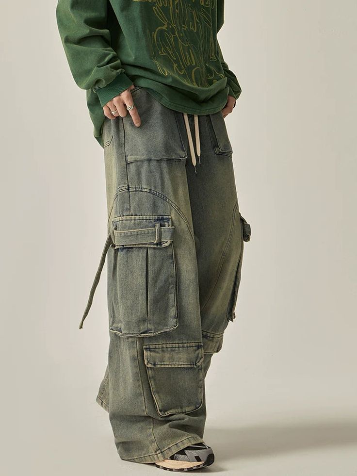 Expertly crafted with a washed denim fabric, these oversized cargo pants offer both style and functionality. The oversized fit provides comfort and versatility, while the cargo pockets add extra storage space. Perfect for everyday wear, these pants are a must-have for any fashion-forward individual. ■size(cm) Length Hips Hem M 106 108 62 L 108 112 64 XL 110 116 66 ■model 174cm 61kg L Workwear Jeans, Pants Y2k, Denim Cargo Pants, Summer Retro, Jean Pockets, Zippered Sweater, Oversized Knitted Sweaters, Washed Denim, Denim Fabric