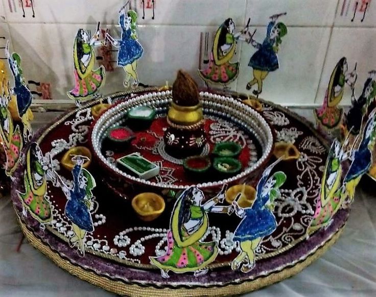 an elaborately decorated tray on display in a room