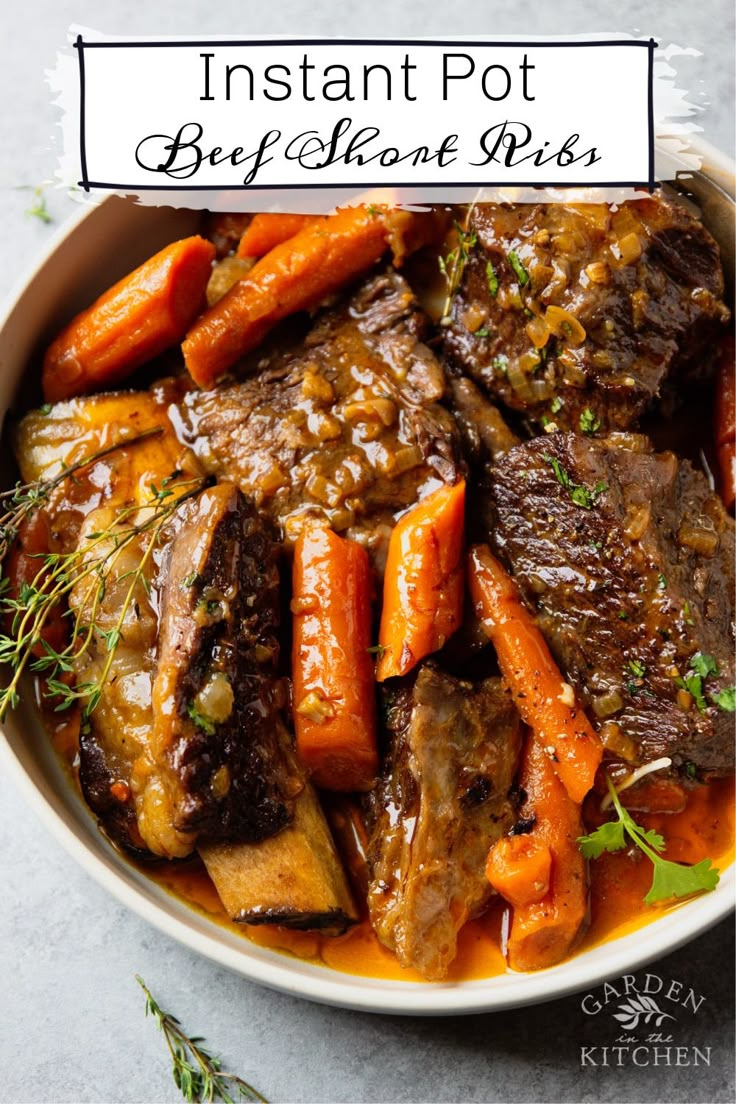 a bowl filled with beef and carrots on top of a table