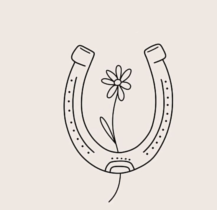 a drawing of a horseshoe with a flower on it