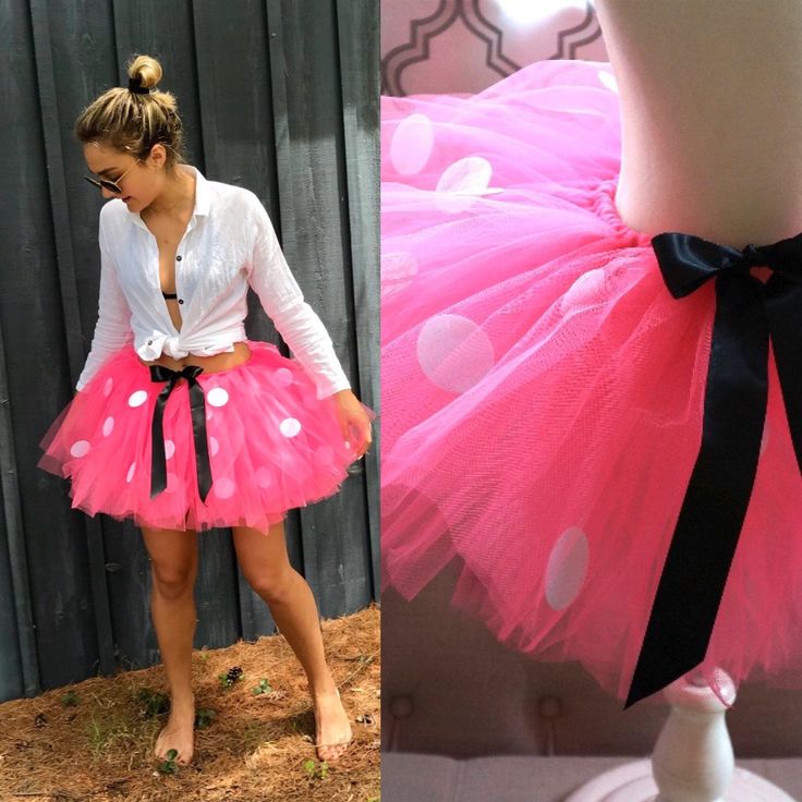 a woman wearing a pink and black polka dot tutu skirt with a bow on the waist