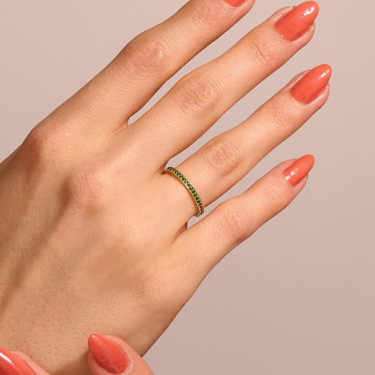 Elevate your style with our exquisite Emerald Wedding Band, a symbol of timeless elegance and natural beauty. Crafted in your choice of 14k, 18k, or 10k solid gold, this eternity stacking ring features a continuous row of stunning green emerald gemstones. Real Solid Gold Handmade Jewelry Pieces For When You Want To Be Shine    Ring Details  ❥ Gold KT: 14k Solid Gold (also in 10, 18K)  ❥ Gold Color Options: Rose Gold, Yellow Gold, White Gold  ❥ Thickness: 1.26 mm  ❥ Band Width: 1.89 mm  ❥ Ready t Minimalist White Gold Emerald Ring For Wedding, Minimalist White Gold Emerald Wedding Ring, Elegant Stackable Half Eternity Rings With May Birthstone, Elegant Stackable Half Eternity Rings For May Birthstone, Minimalist Emerald Diamond Ring For Wedding, Stackable Emerald Ring With Round Band, Minimalist Emerald Ring With Round Band For Weddings, Minimalist Round Band Emerald Wedding Ring, Minimalist Emerald Ring For May Wedding