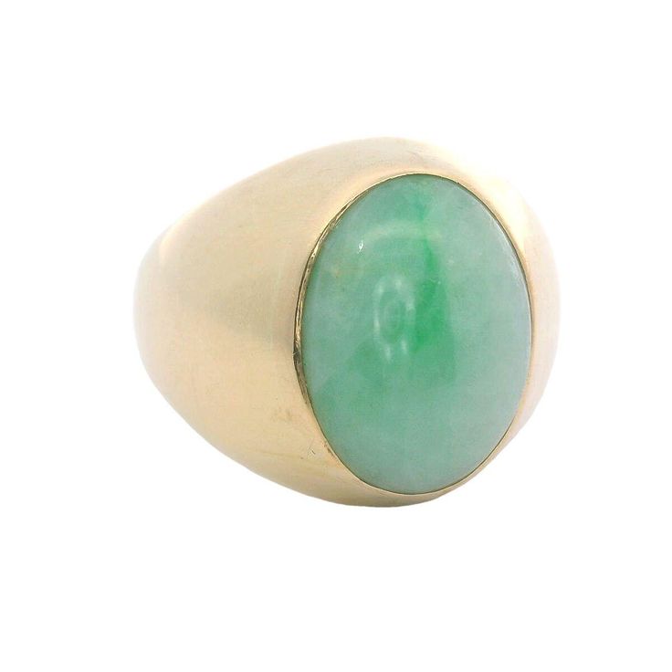 Experience the timeless elegance of our Oval Cabochon Jade and 14K Yellow Gold Vintage Ring. The smooth cabochon jade and bold gold setting exude sophistication and luxury. Elevate any outfit with this classic, vintage piece that will never go out of style. Jewelry Style : Ring Metal Type : 14K Gold  Jade: Oval approximately 17mm x 13mm Ring Size : 9.5 : Can be sized by your jeweler estate piece, sold as is, all weights are estimates Formal Oval Jade Emerald Ring, Elegant Cabochon Emerald Ring For Formal Occasions, Classic Gold Emerald Cabochon Ring, Classic Polished Jade Jewelry, Classic Green Oval Cabochon Signet Ring, Classic Domed Emerald Ring For Formal Occasions, Classic Jade Jewelry, Classic Jade Rings With Polished Finish, Modern Cabochon Emerald Ring For Formal Occasions