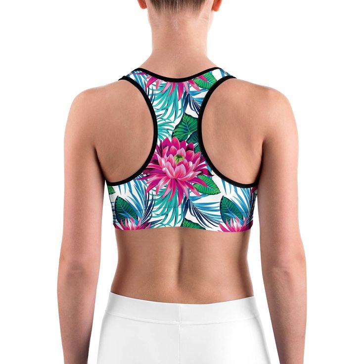 This gorgeous sports bra is made from moisture-wicking material that stays dry during low and medium intensity workouts. The bra has support material in the shoulder straps, double layer front, and a wide elastic band to ensure constant support. White Sports Bra, Intense Workout, Charlotte Nc, Tropical Flowers, Moisture Wicking Fabric, Scoop Neckline, Elastic Band, Shoulder Straps, Double Layer