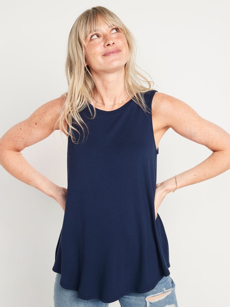 Our Luxe tank tops are supremely soft and drape beautifully.  You deserve it.  High, rounded neck.  Sleeveless.  Curved hem.  Center seam in back.  Super-soft rayon jersey, with comfortable stretch.  @modelsizes 5’9":S | 5'7":L | 5'10":XL @modelsiz Chic Blue Tank Top For Everyday, Chic Blue Everyday Tank Top, Summer Stretch Sleeveless Tank Top, Summer Stretch Tank Top, Summer Chic Crew Neck Tank Top, Chic Crew Neck Tank Top For Summer, Versatile Sleeveless Tops, Versatile Sleeveless Vest Top, Casual High Neck Stretch Tank Top