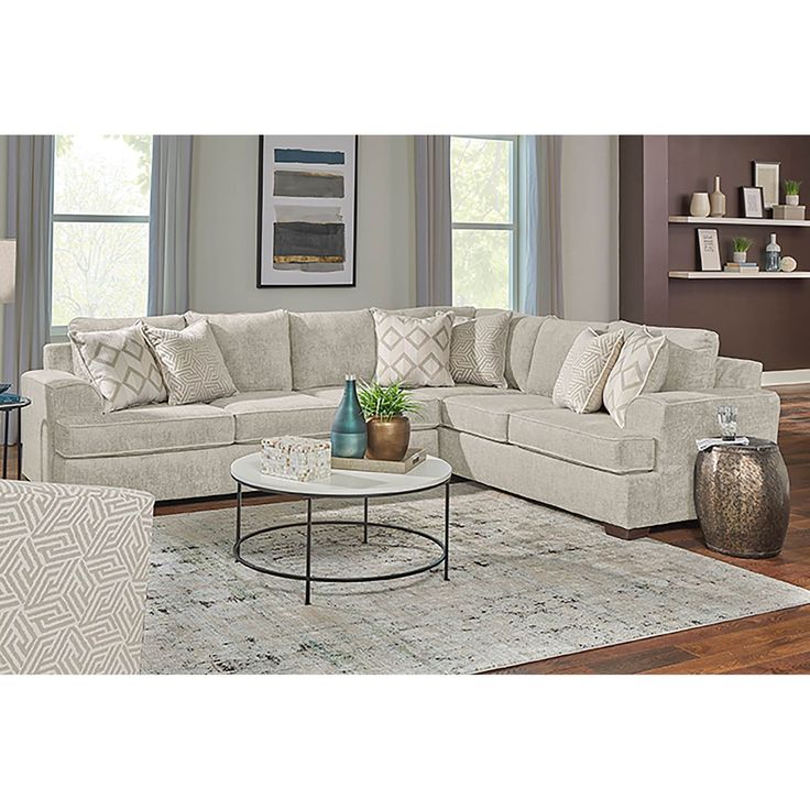 a living room scene with focus on the sectional sofa