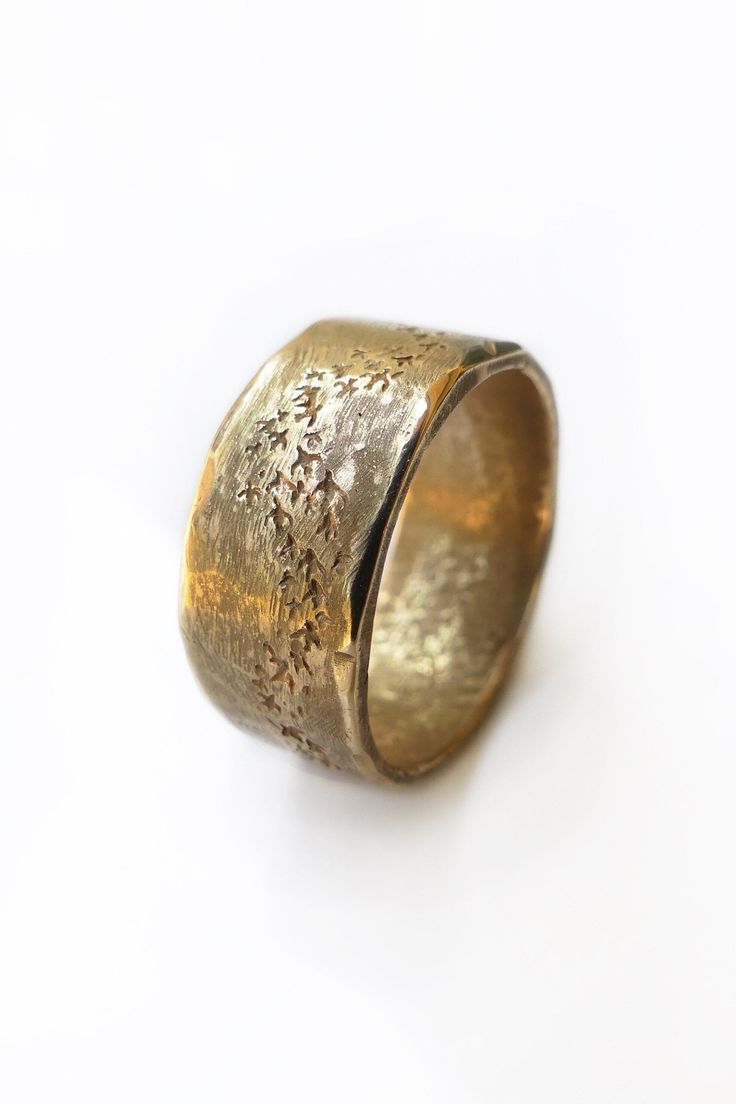 This handmade rustic masculine ring is hand carved in solid 14k yellow gold and features a murmuration design.  The nature inspired masculine ring has irregular filed edges finished with a high polish - creating a visually appealing contrast to the matte rough filed middle area of the band.  The starling birds on this large solid gold ring are carved to resemble the fluid like movement of a murmuration.  This rustic gold ring makes the perfect unique wedding band for a nature lover.  Murmuration Rustic Gold Wedding, Starling Birds, Thick Gold Ring, Rustic Wedding Bands, Bird Ring, Simple Wedding Bands, Stacked Wedding Rings, Bird Rings, Wedding Band Designs