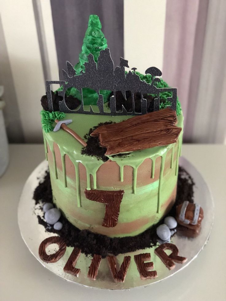 a cake with green frosting and brown icing that says rockin'over