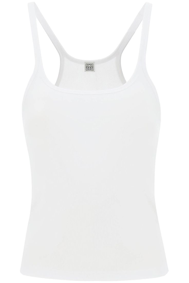 Made from stretch organic cotton rib, this Totême's fitted tank top is designed with a scoop neckline, a racer back and curved armholes. The model is 177 cm tall and wears a size XS. Size Info STANDARD Color Detail White Made In Portugal Material 95%CO 05%EA Season One spring Season Two summer Product clothing Brand Toteme Size And Fit Rib Tank Top, Fitted Tank Top, White Sleeveless Top, Latest Fashion Design, Scoop Neck Tank Top, Ribbed Tank Tops, Workout Tank Tops, White Tank Top, Racer Back