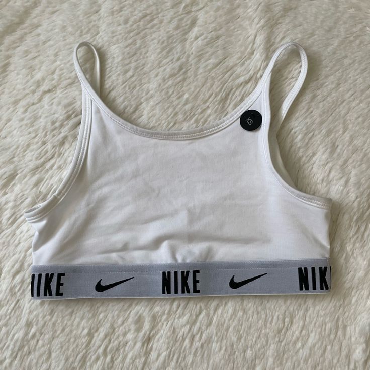 White Drifit Sports Training Bra By Nike Girl Size: Xs New With Tags, Doesn’t Fit My Daughter Stretchy Cotton Blend Smoke Free Home Open To Reasonable Offers Bundle & Save Big Sporty Stretch Cotton Sports Bra, Sporty Cotton Stretch Sports Bra, Sporty Cotton Sports Bra, Nike Stretch Tops For Light Sports, Stretch Cotton White Sports Bra, White Stretch Cotton Sports Bra, Stretch Sports Bra For Workout, White Cotton Stretch Sports Bra, Sporty White Cotton Sports Bra