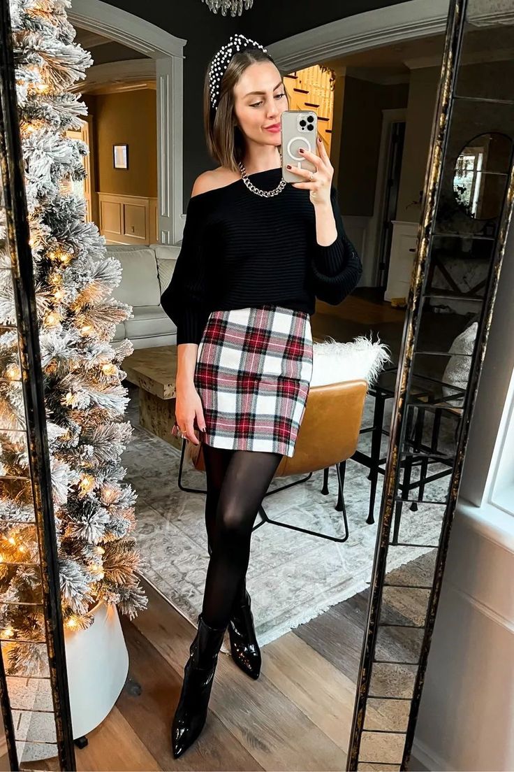 Flannel Skirt Outfits Winter, Christmas Mini Skirt Outfit, Red Miniskirt Outfits, Plaid Skirt Black Tights, Holiday Plaid Skirt Outfit, Leather Skirt Outfit Christmas Party, Plaid Christmas Skirt Outfit, Christmas Sweater Skirt Outfit, Mini Skirt Christmas Outfit