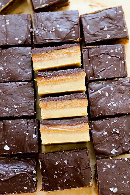 there are many pieces of chocolate that have been cut into squares and stacked on top of each other