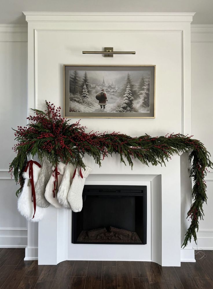 a fireplace with stockings hanging from it's mantle