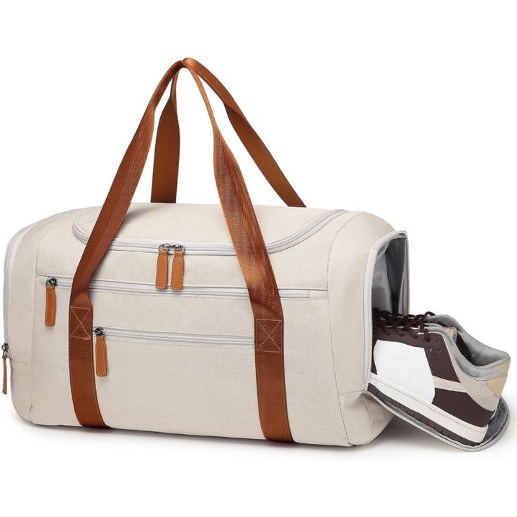 Introducing the elegant canvas duffle bag, perfect for your gym sessions and travel adventures. Crafted with durable materials and designed for practicality, this bag combines style and functionality effortlessly. Features: Material: Made from high-quality canvas with leather accents, ensuring durability and a sophisticated look. Design: Features a classic design with dual-tone handles and multiple compartments, including a side shoe pocket. Special Features: Includes a dedicated shoe compartmen Casual Cotton Bags For Overnight Trips, Casual Cotton Bag For Overnight Trips, Cotton Bag With Luggage Sleeve For Overnight Trips, Cotton Bags With Luggage Sleeve For Overnight Trips, Casual Cotton Duffle Bag For Overnight Trips, Canvas Shoulder Bag With Large Capacity For Overnight Trips, Large Canvas Shoulder Bag For Overnight Trips, Functional Cotton Bag For Overnight Trips, Large Capacity Cotton Duffle Bag