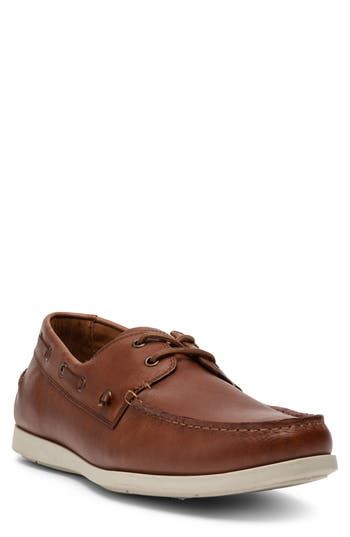 Elastic reinforcements on the tongue lend a versatile twist to this dapper leather boat shoe that can be worn with or without the laces. Leather upper/leather and textile lining/rubber sole Imported Brown Boat Shoes With Textured Sole And Plain Toe, Leather Boat Shoes With Branded Insole, Leather Boat Shoes With Plain Toe, Leather Boat Shoes For Boating, Leather Plain Toe Boat Shoes, Brown Leather Loafers For Boating, Low-top Leather Boat Shoes, Leather Boat Shoes With Stitched Sole For Boating, Brown Leather Boat Shoes With Textured Sole