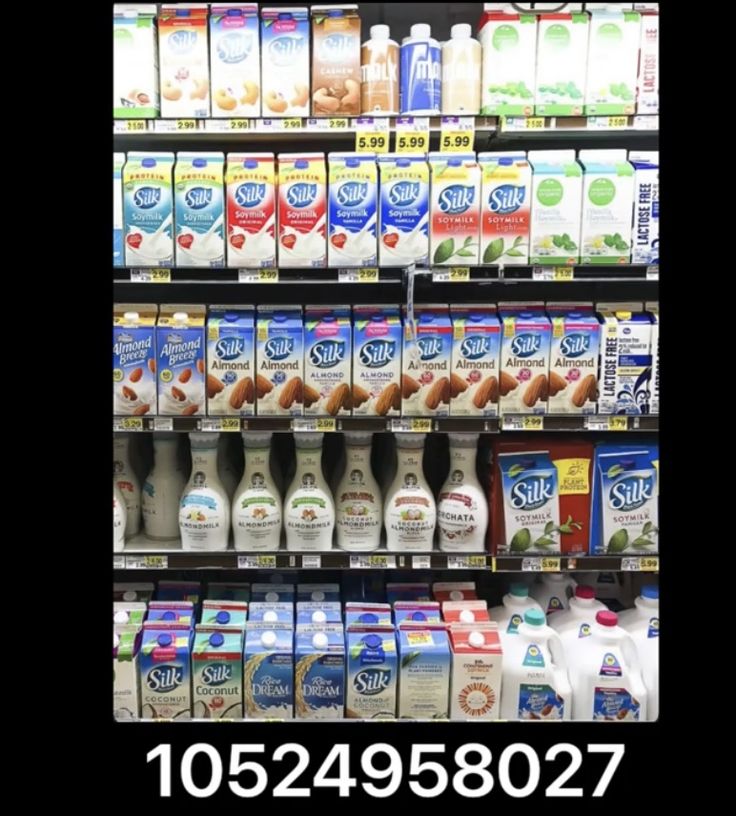 a display in a grocery store filled with milk