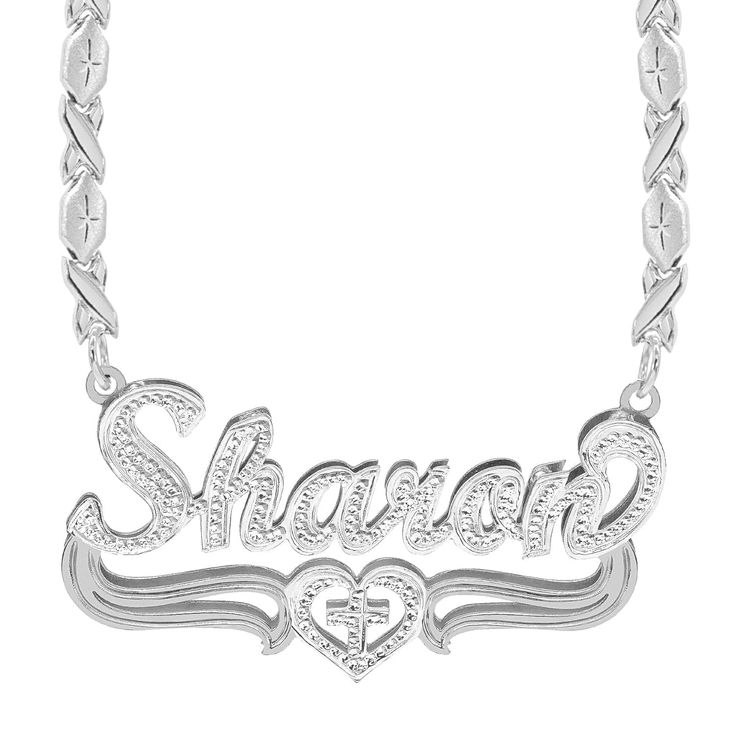 This Rhodium Beaded "Sharon" Nameplate is available in either Sterling Silver, and Gold over Silver. This design includes the heart with a cross inside. Choose up to 10 characters to make your unique name. Customizable With: Names, or Words Closure: Lobster Clasp Metal Selection: Sterling Silver 14k Gold over Silver Silver Heart-shaped Custom Name Necklace, Silver Heart Shaped Custom Name Necklace, Custom Name Heart-shaped Silver Necklace, Silver Name Necklace With Cross Shape, Silver Cross Jewelry With Name, Silver Cross Necklaces With Name Detail, Silver Name Necklace With Cross Pendant, Silver Cross Pendant Necklace With Name, Customized Silver Heart Necklace