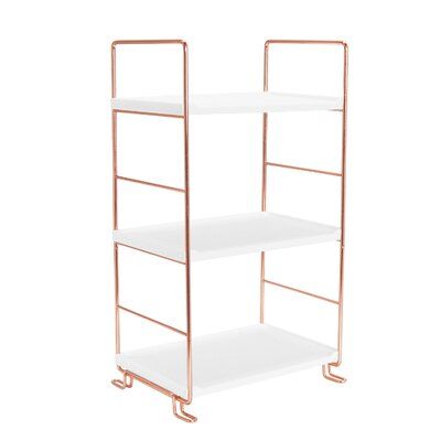 three tiered metal shelf with white shelves on each side and gold handles, against a white background